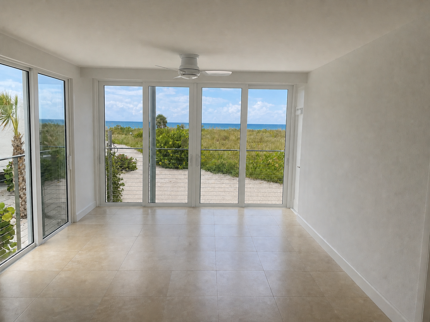 Empty oceanfront room before interior design