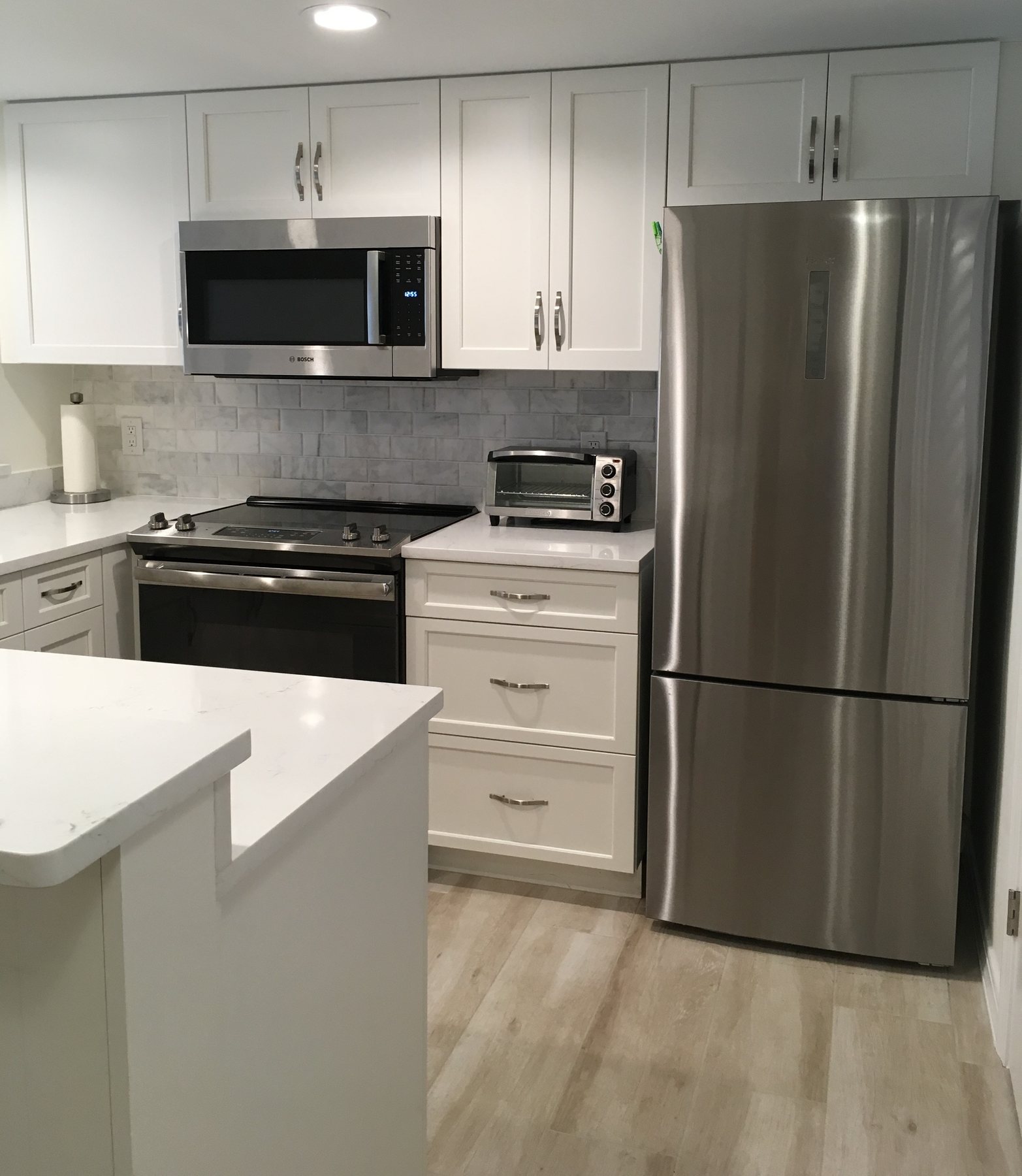 Kitchen cabinetry and appliances